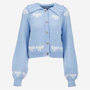 Sincerely Jules| Blue Cardigan Sweater with bows and gold button look.